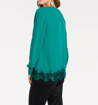 Elegante Spitzenbluse in Smaragdgrün mit tiefem Ausschnitt​